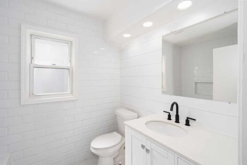 Bathroom featuring ambient lighting and neutral tones